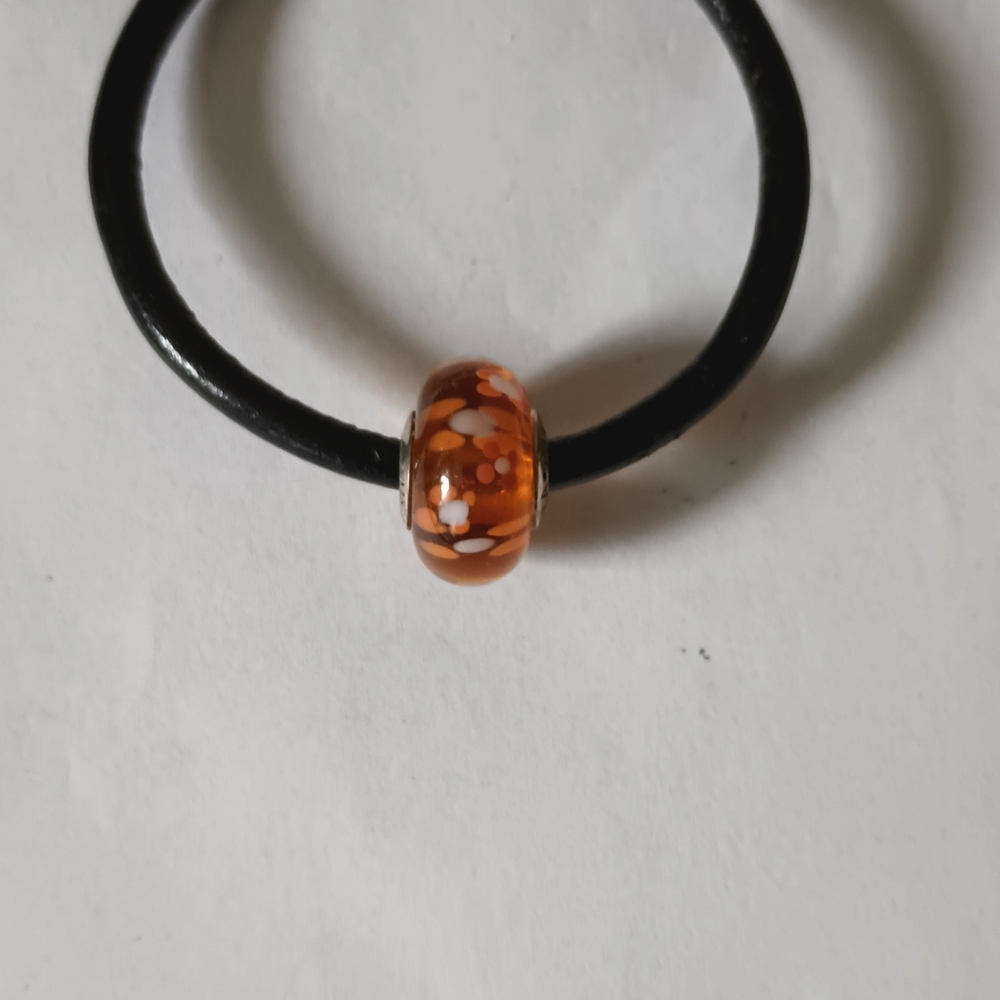 Pandora Retired Red Murano Charm on Leather bracelet.Sterling Silver Clasp.